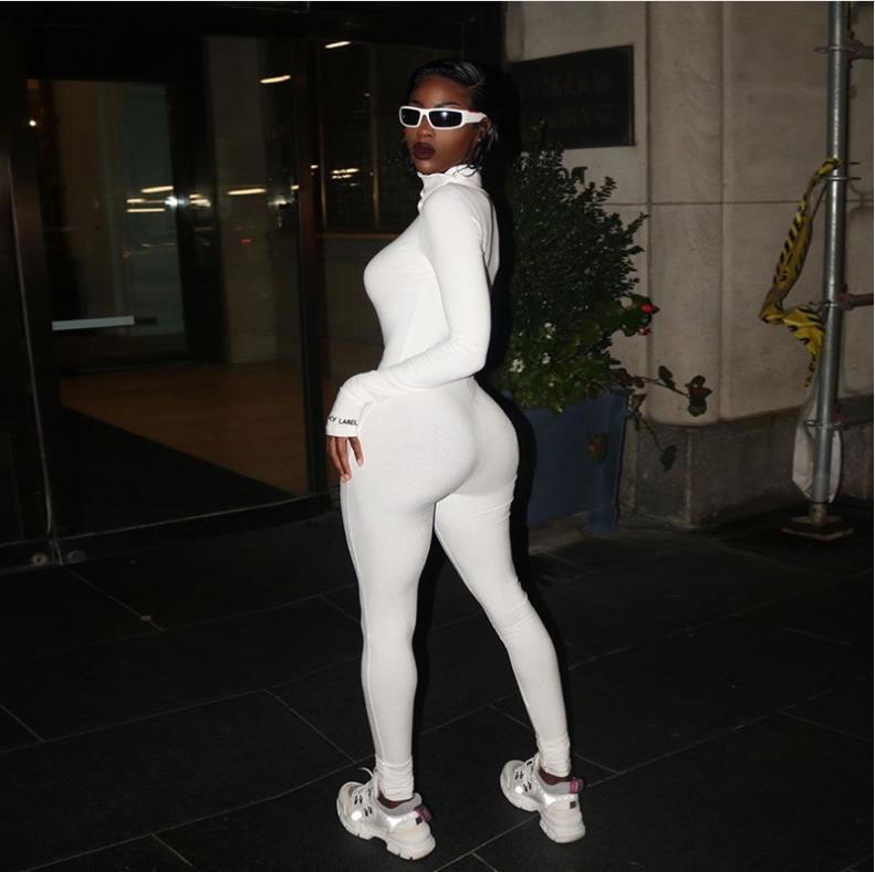 Women's Faux Leather Jumpsuit - Zip Front Bodycon